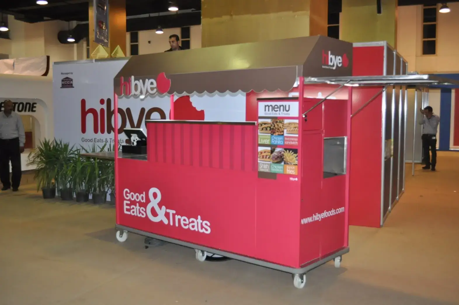Mobile catering cart setup with fresh gourmet food display